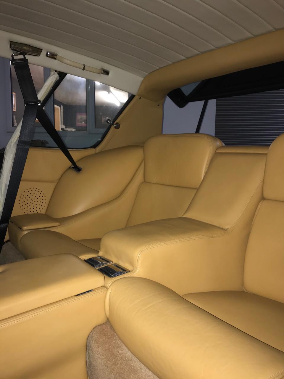 Retrimmed rear hoop and C pillars in tan leather to match recent interior which we are refitting as it was in excellent condition, new carpets in Jensen shade, new seat belts courtesy of Rejen
